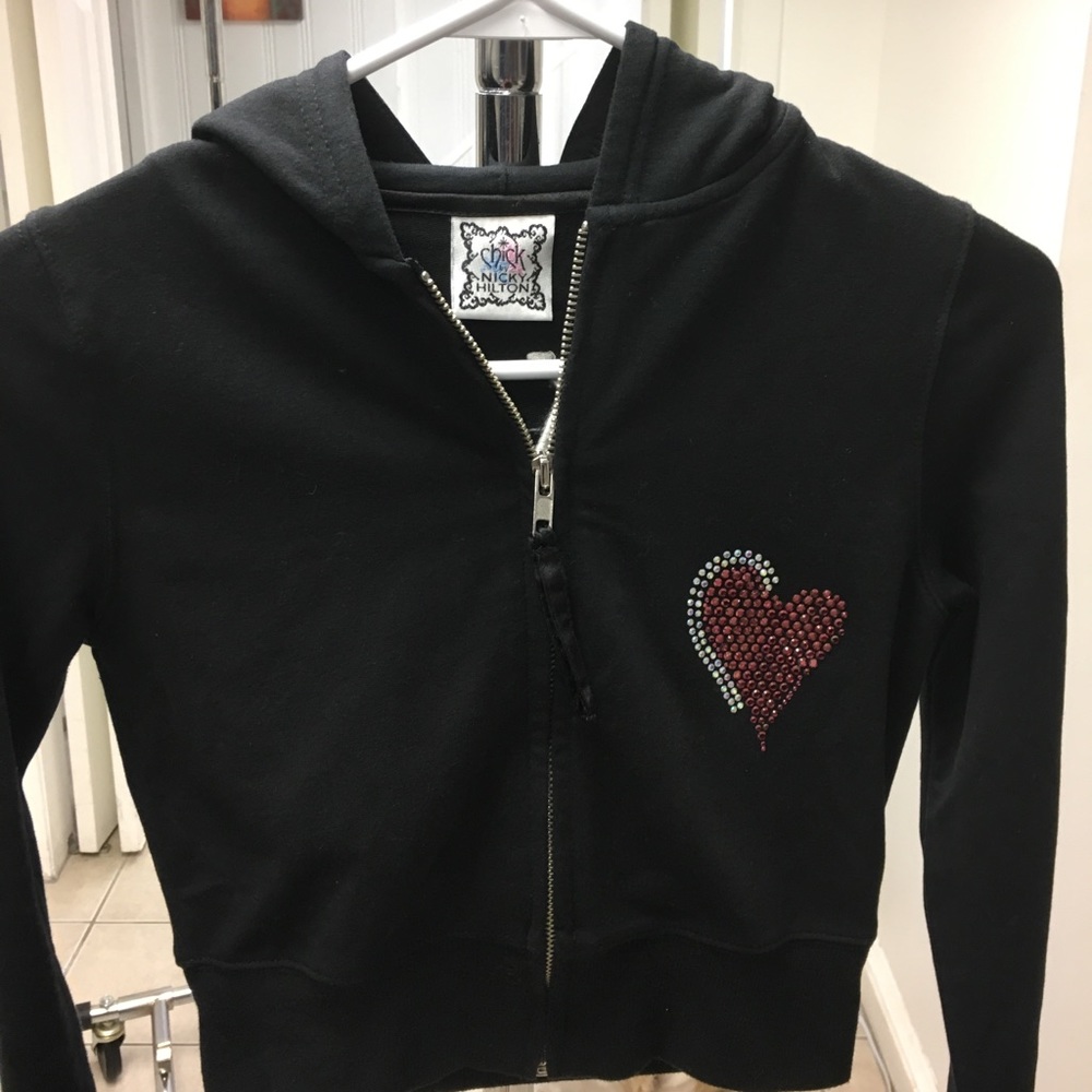 Collectible hoodie with a front blink heart